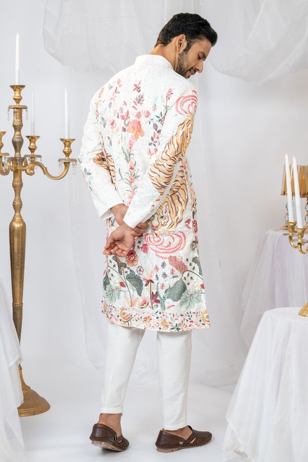 Semi Silk Kurta Set With Sequins And Resham Embroidery