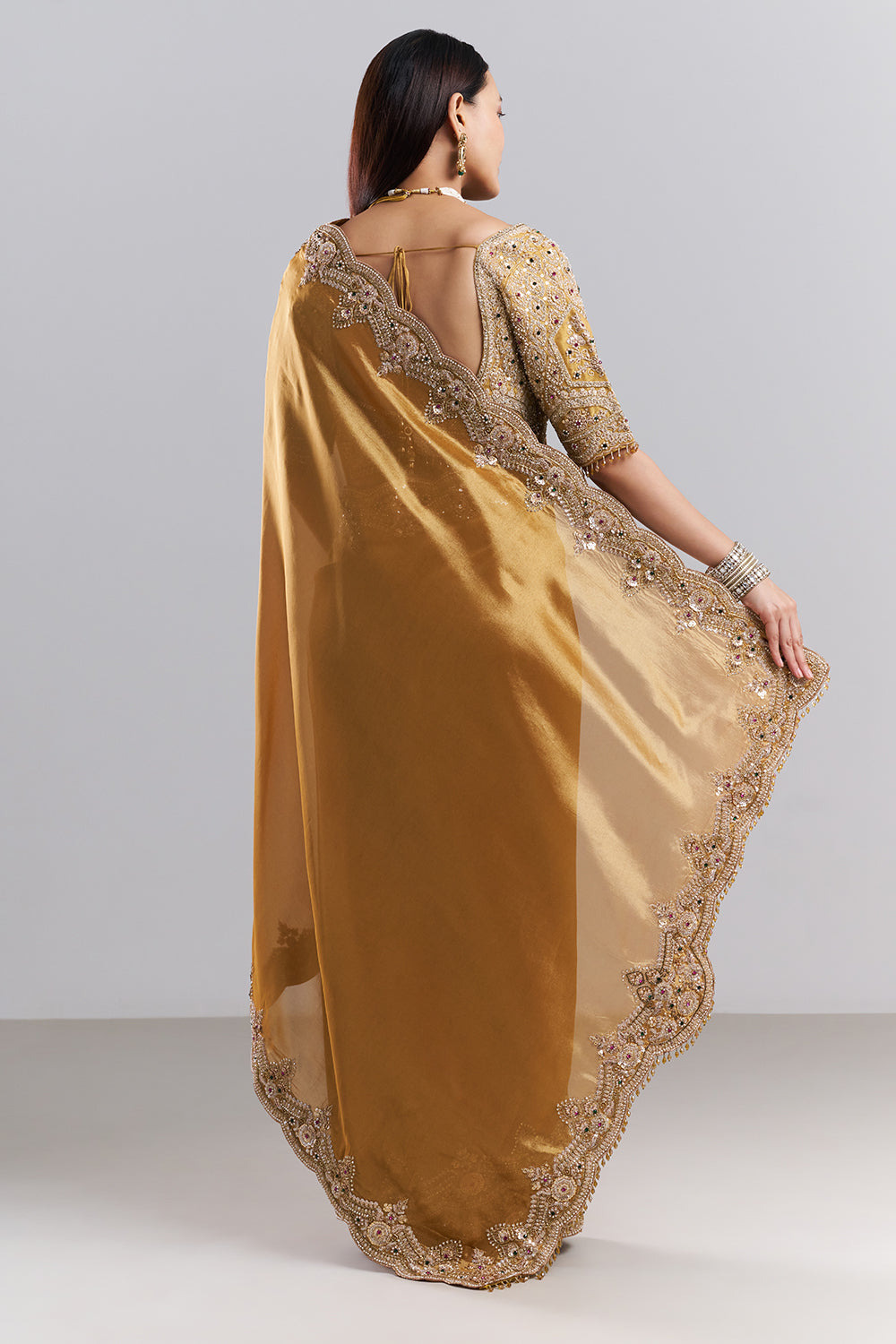 Antique Gold Embellished Border Saree and Stitched Blouse