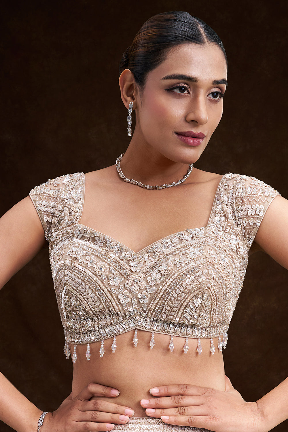 Beige Gold Net Bridal Lehenga with Floral Cutdana and Sequin Work