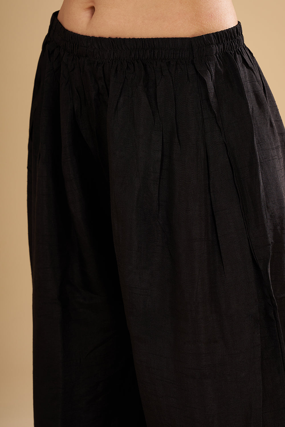 Black Pure Silk High-Low Tunic with Rose Gold Zardozi Hand Embroidery and Silk Palazzo