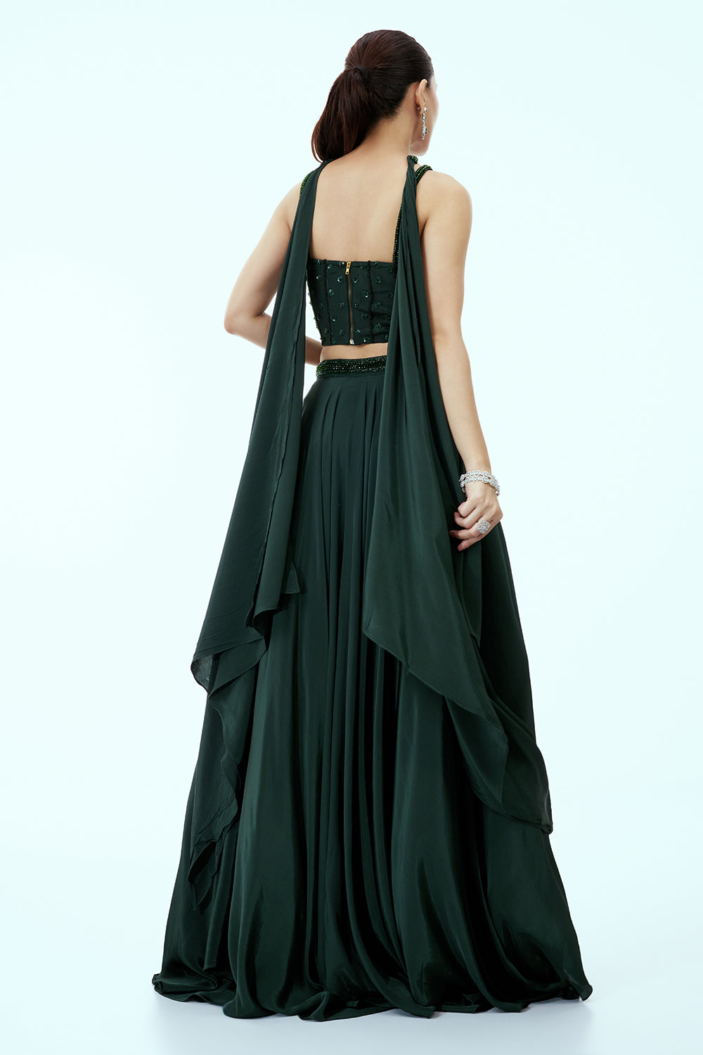 Bottle Green Crepe Silk Lehenga with Hand Embroidered Corset Blouse
