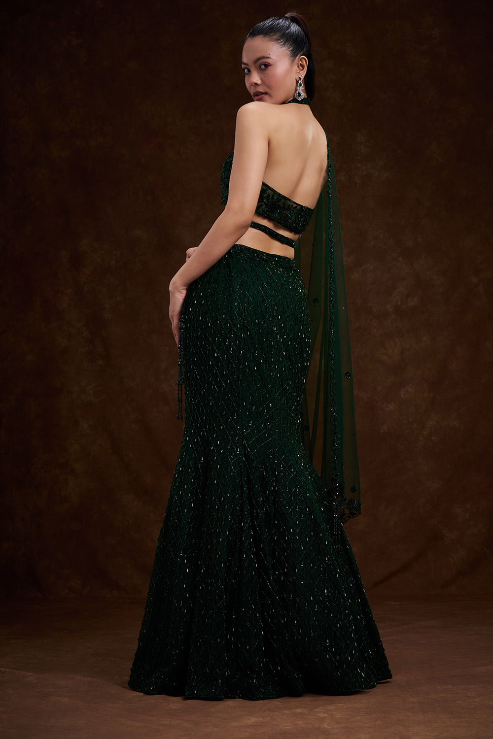 Bottle Green Net Bridal Lehenga with Cutdana and Bead Work