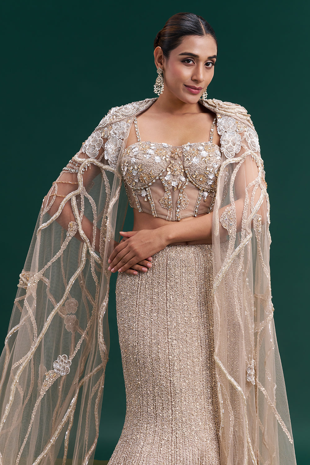 Champagne Gold Net Bridal Lehenga with Vine Embroidery and Statement Cape