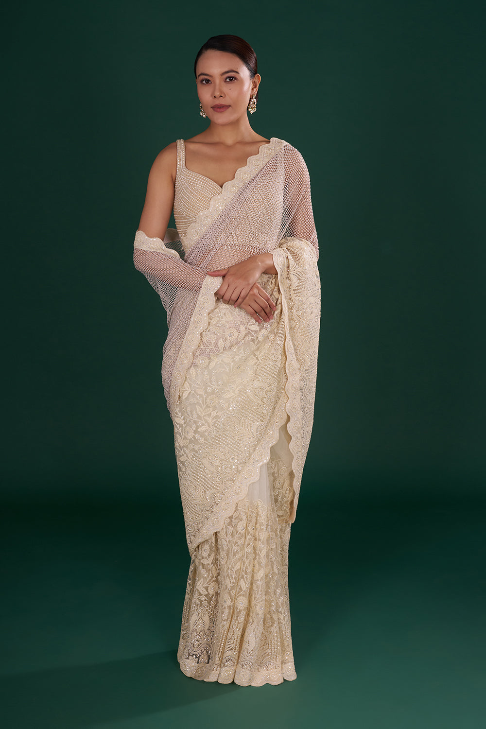 Champagne Gold Net Saree with Scalloped Border and Unstitched Blouse