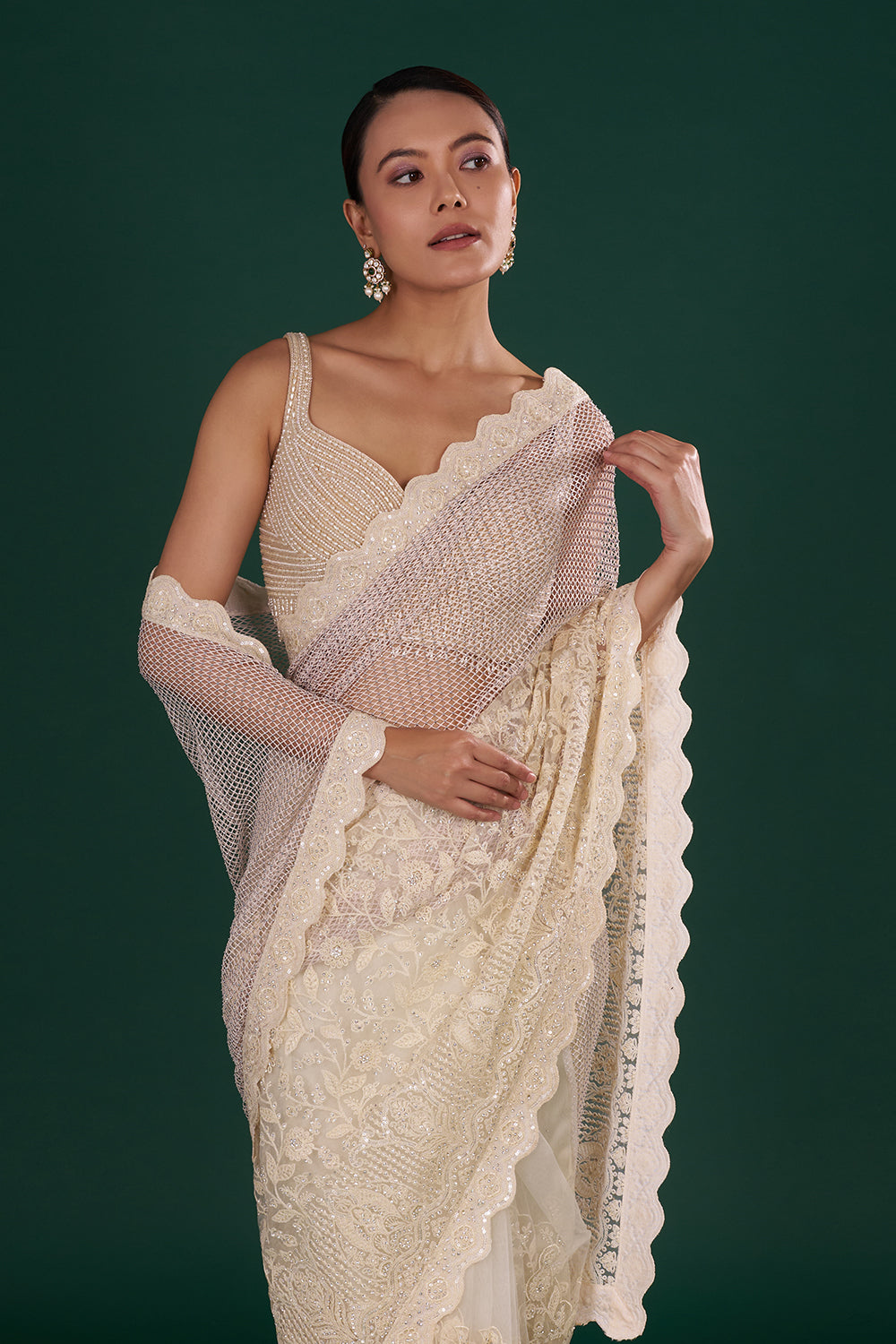Champagne Gold Net Saree with Scalloped Border and Unstitched Blouse