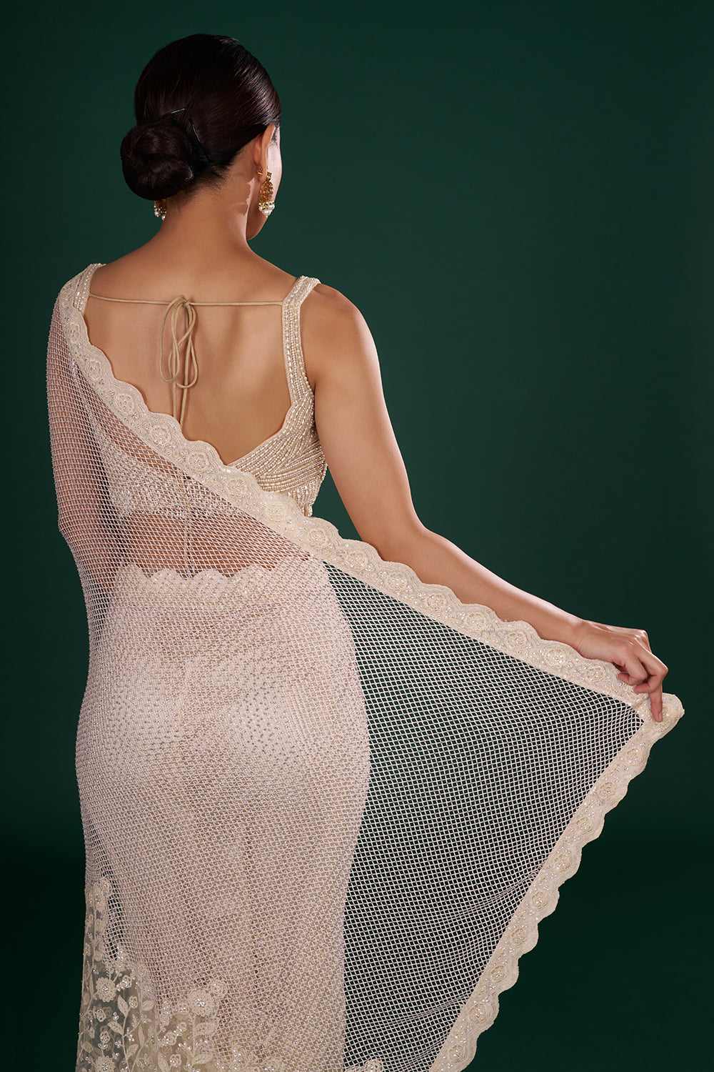 Champagne Gold Net Saree with Scalloped Border and Unstitched Blouse