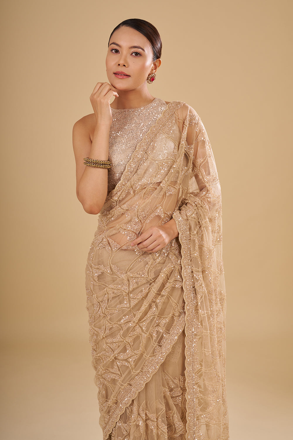 Champagne Gold Net Saree with Sequin Embroidery and Unstitched Blouse