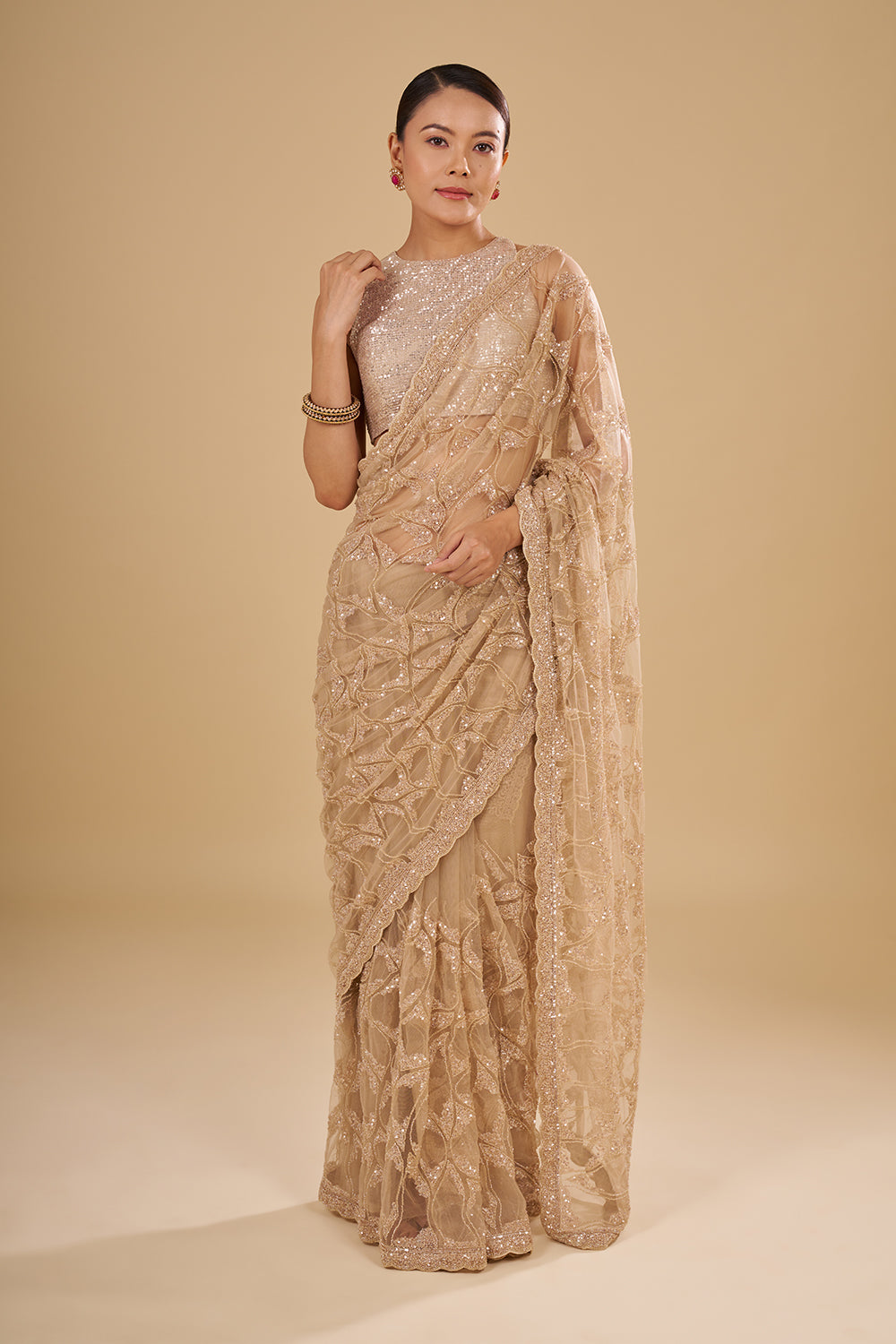 Champagne Gold Net Saree with Sequin Embroidery and Unstitched Blouse