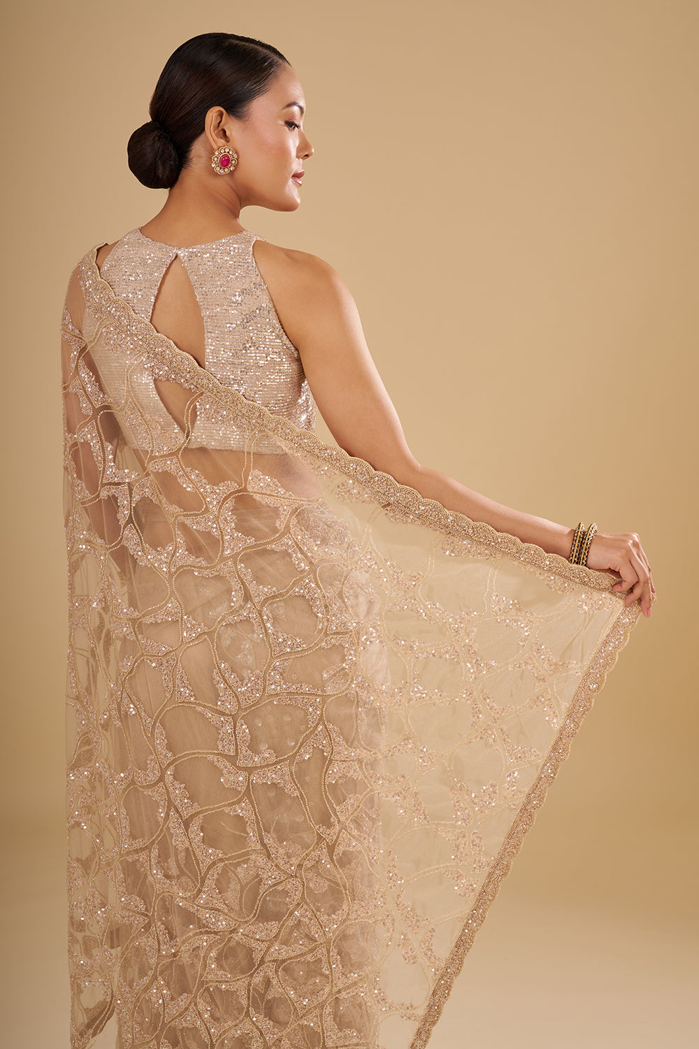 Champagne Gold Net Saree with Sequin Embroidery and Unstitched Blouse