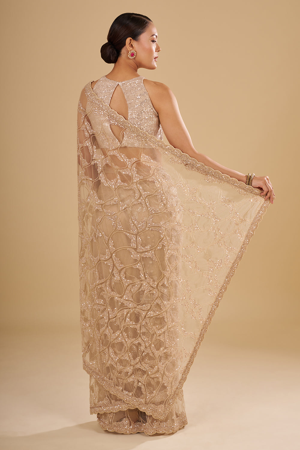 Champagne Gold Net Saree with Sequin Embroidery and Unstitched Blouse