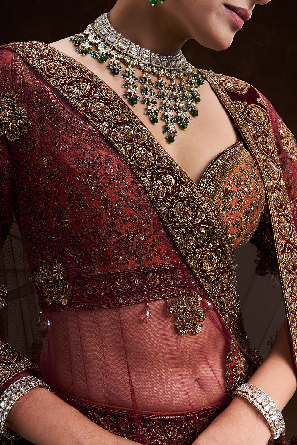 Copper Rust Raw Silk Bridal Lehenga with Palatial Motifs and Zardozi Work