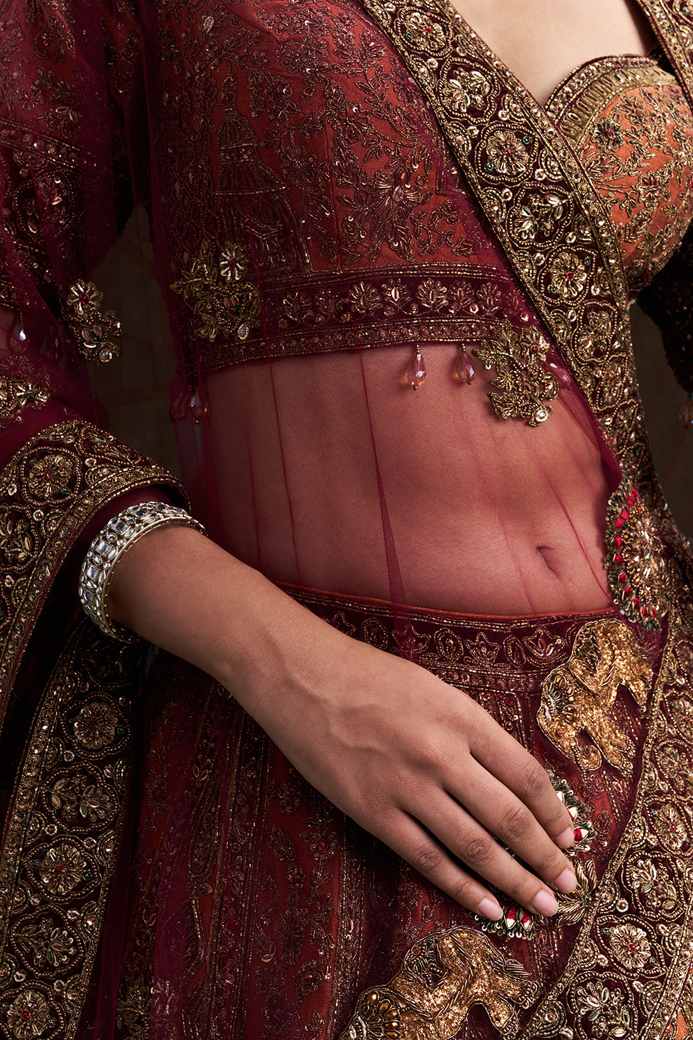 Copper Rust Raw Silk Bridal Lehenga with Palatial Motifs and Zardozi Work