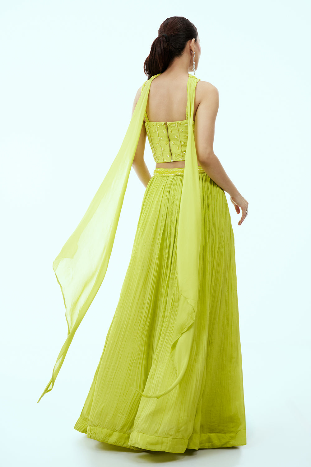 Fluroscent Green Crepe Lehenga with Hand Embroidered Corset Blouse