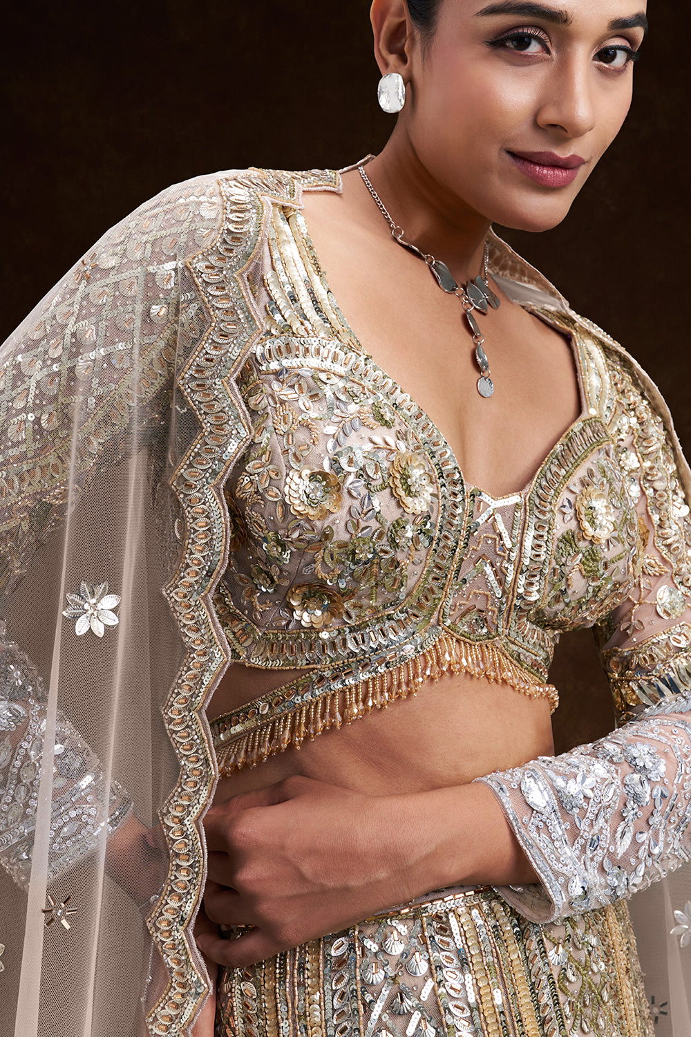Gold and Silver Ombré Net Bridal Lehenga with 3D Floral Embellishments
