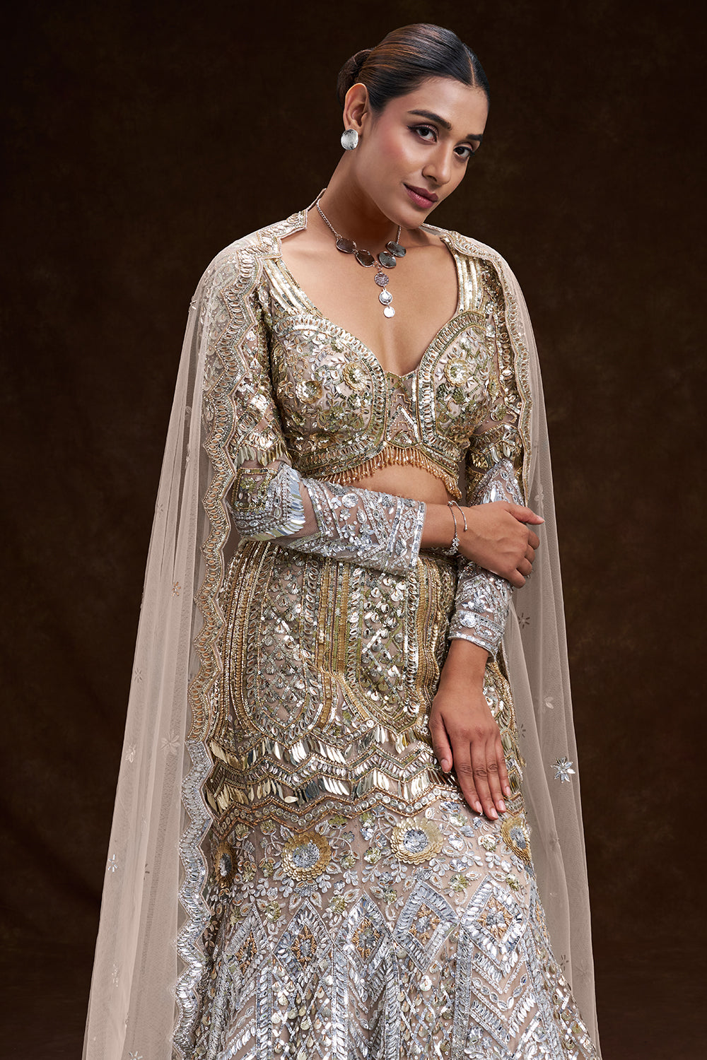 Gold and Silver Ombré Net Bridal Lehenga with 3D Floral Embellishments