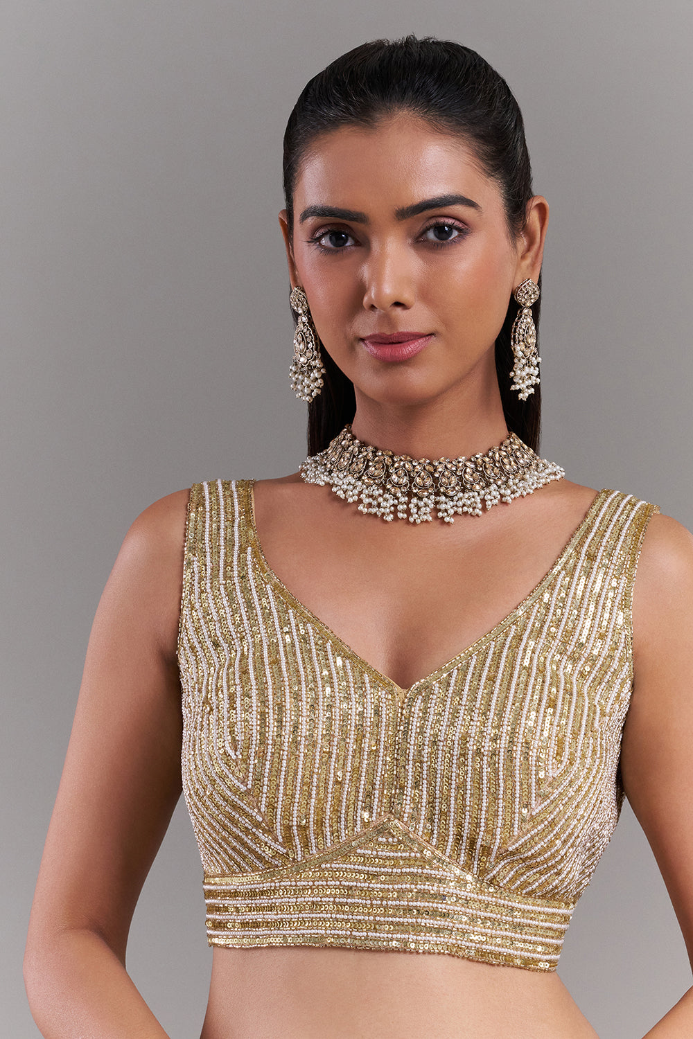 Gold Shimmer Blouse with Sculpted Linear Detailing