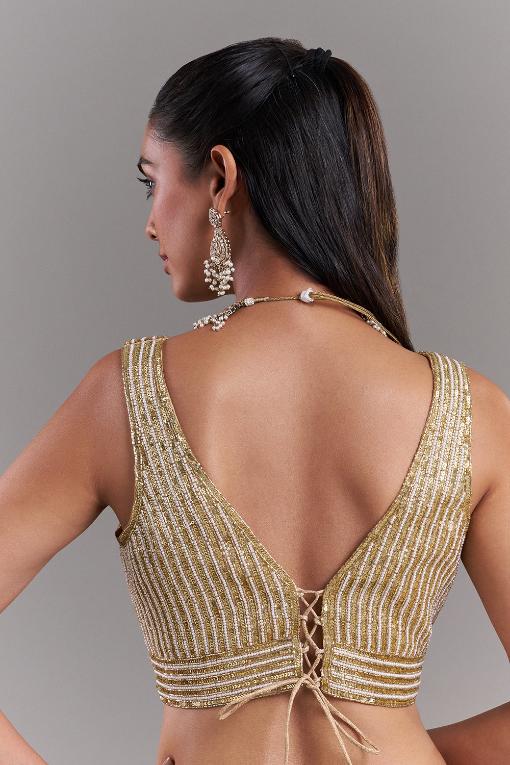 Gold Shimmer Blouse with Sculpted Linear Detailing