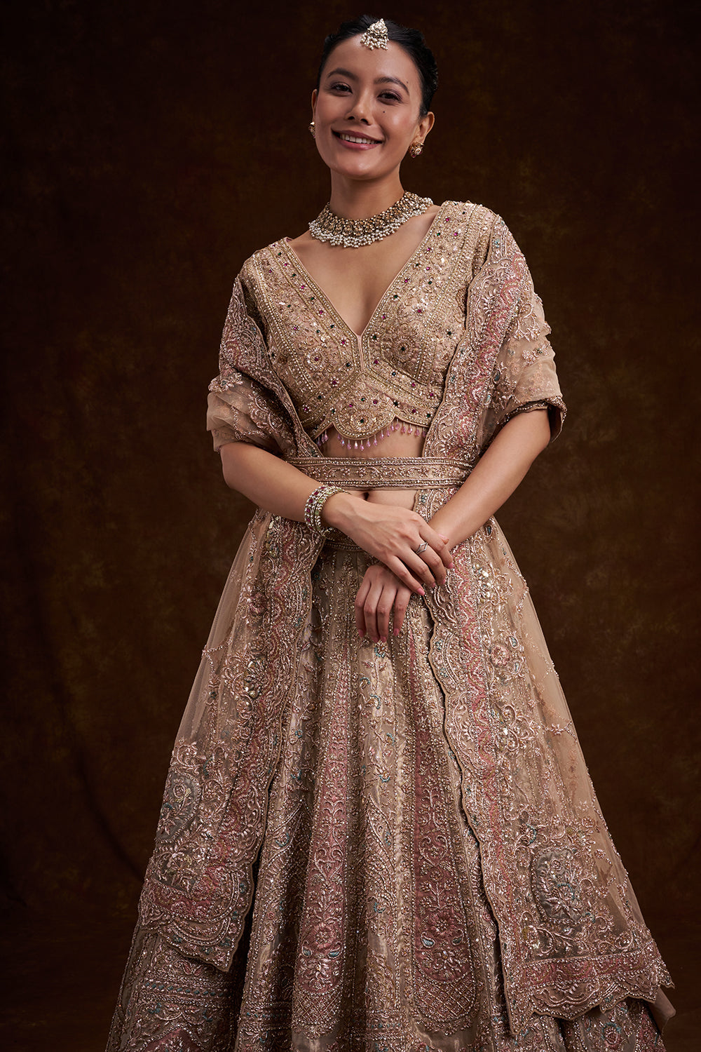 Gold Tissue Silk Bridal Lehenga with Cutdana Work and Unstitched Blouse