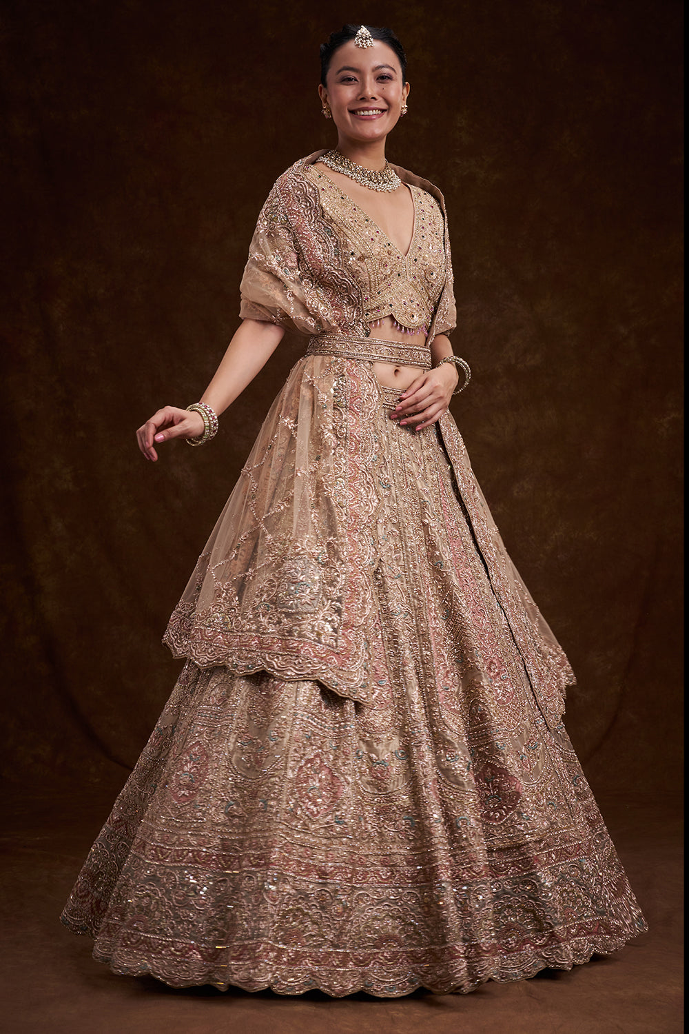 Gold Tissue Silk Bridal Lehenga with Cutdana Work and Unstitched Blouse