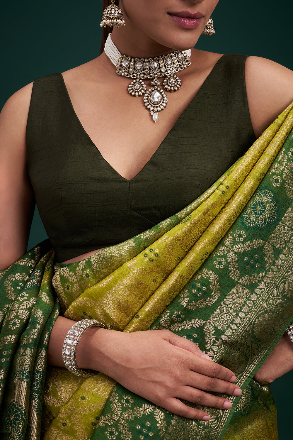 Green Dola Silk Saree with Banarasi-Inspired Motifs and Unstitched Blouse