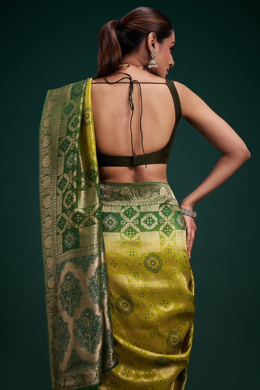 Green Dola Silk Saree with Banarasi-Inspired Motifs and Unstitched Blouse