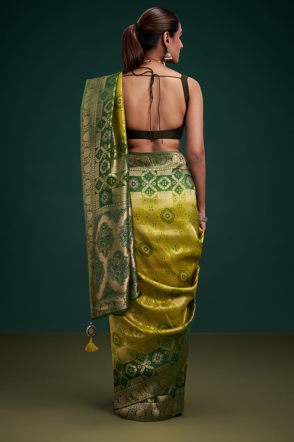 Green Dola Silk Saree with Banarasi-Inspired Motifs and Unstitched Blouse
