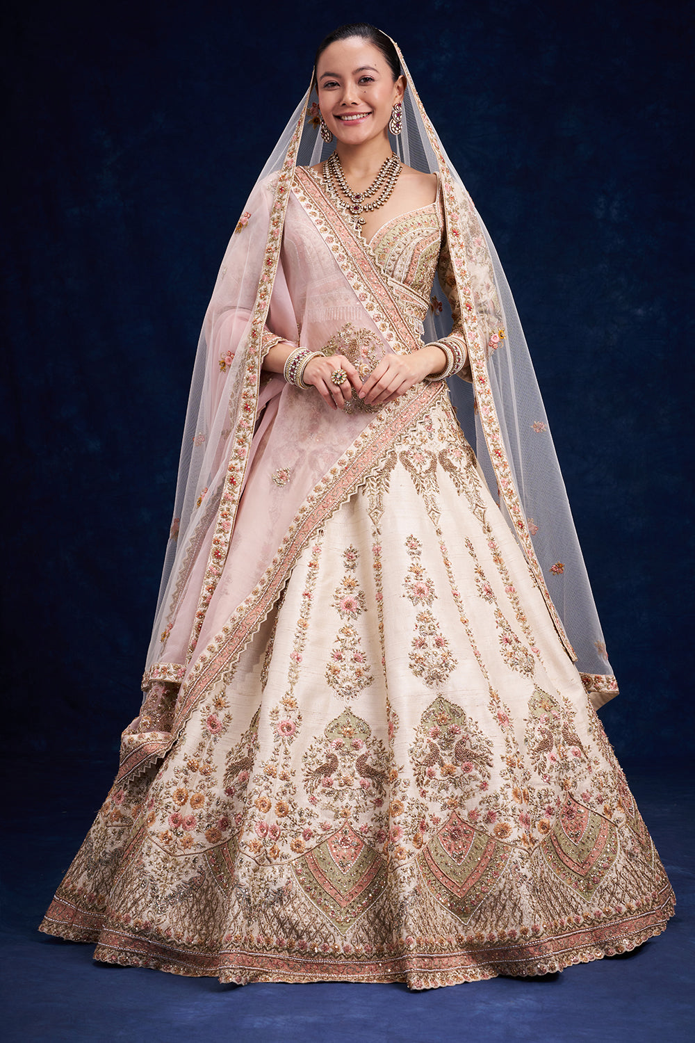 Ivory Raw Silk Bridal Lehenga with Cutdana and Zari Work
