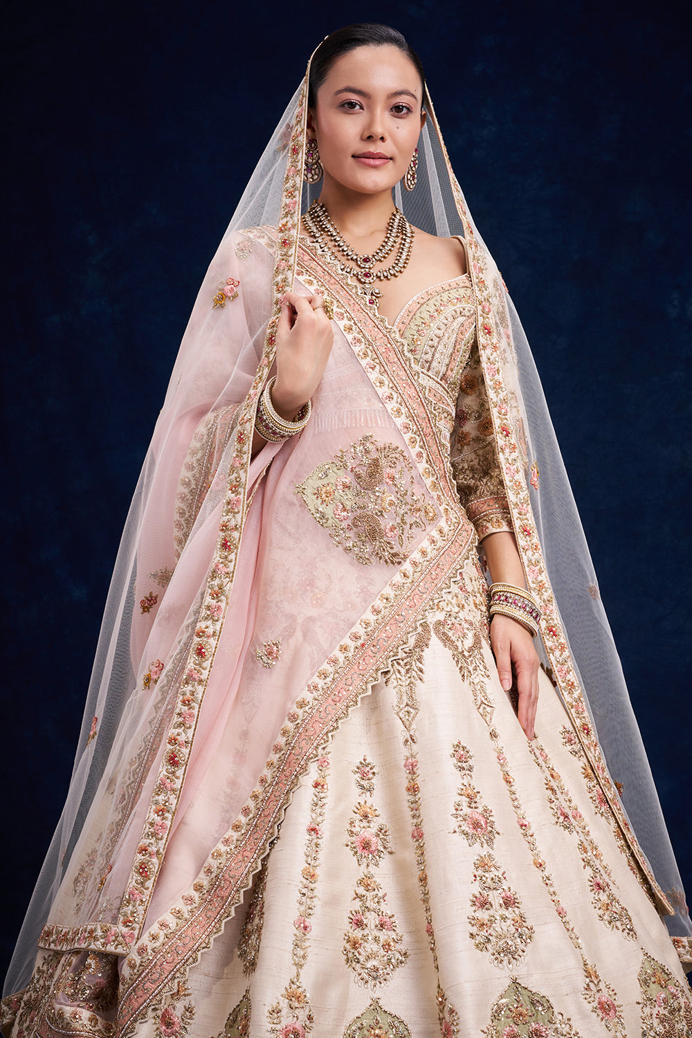Ivory Raw Silk Bridal Lehenga with Cutdana and Zari Work