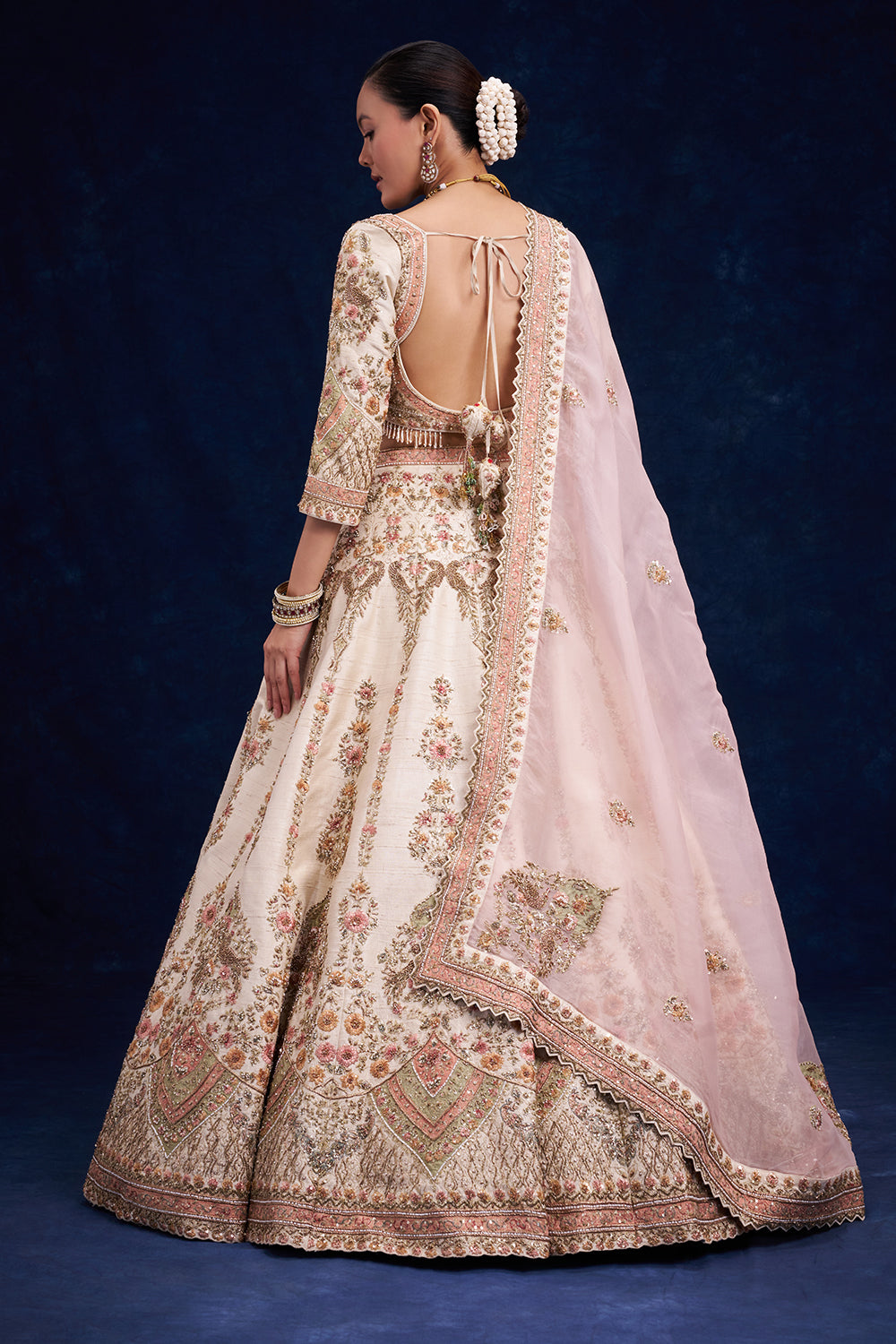 Ivory Raw Silk Bridal Lehenga with Cutdana and Zari Work