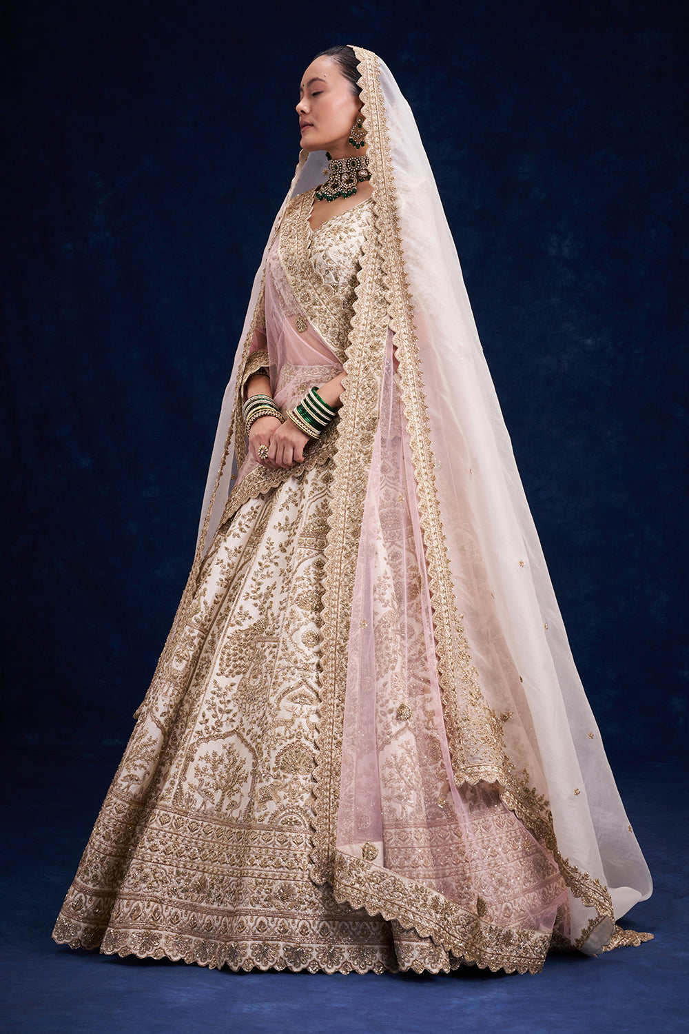 Ivory Raw Silk Bridal Lehenga with Zardozi and Zari Work
