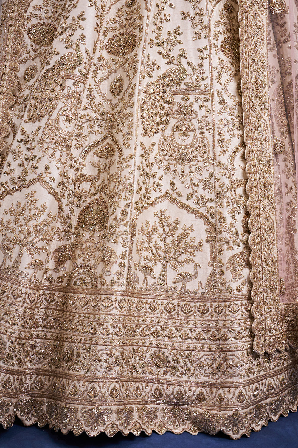 Ivory Raw Silk Bridal Lehenga with Zardozi and Zari Work