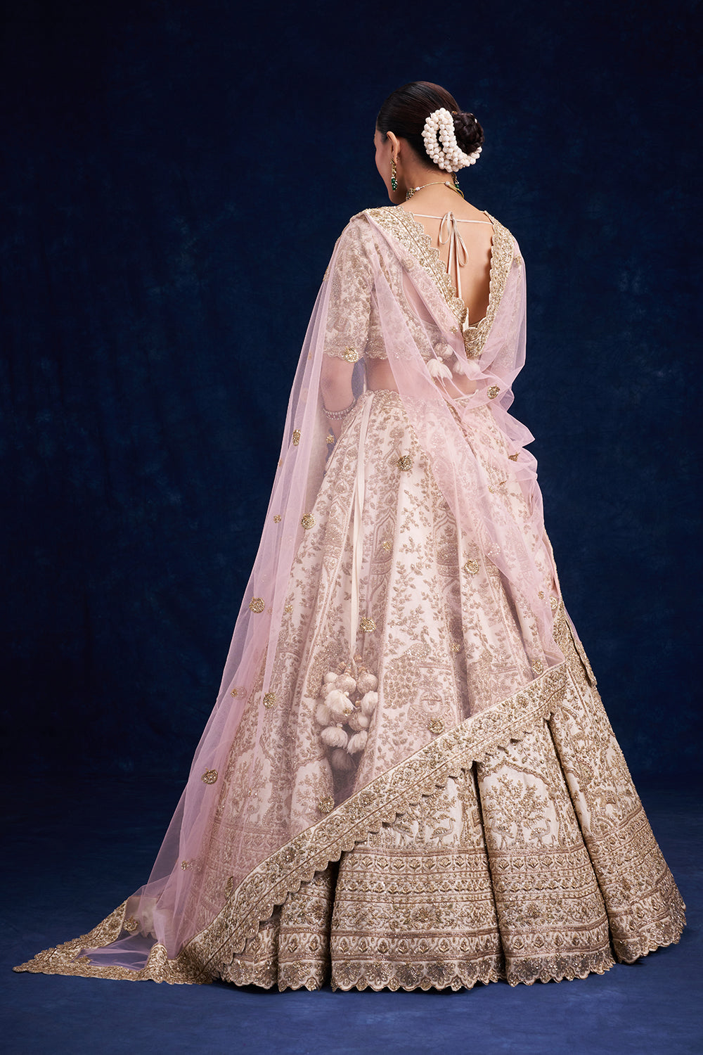 Ivory Raw Silk Bridal Lehenga with Zardozi and Zari Work