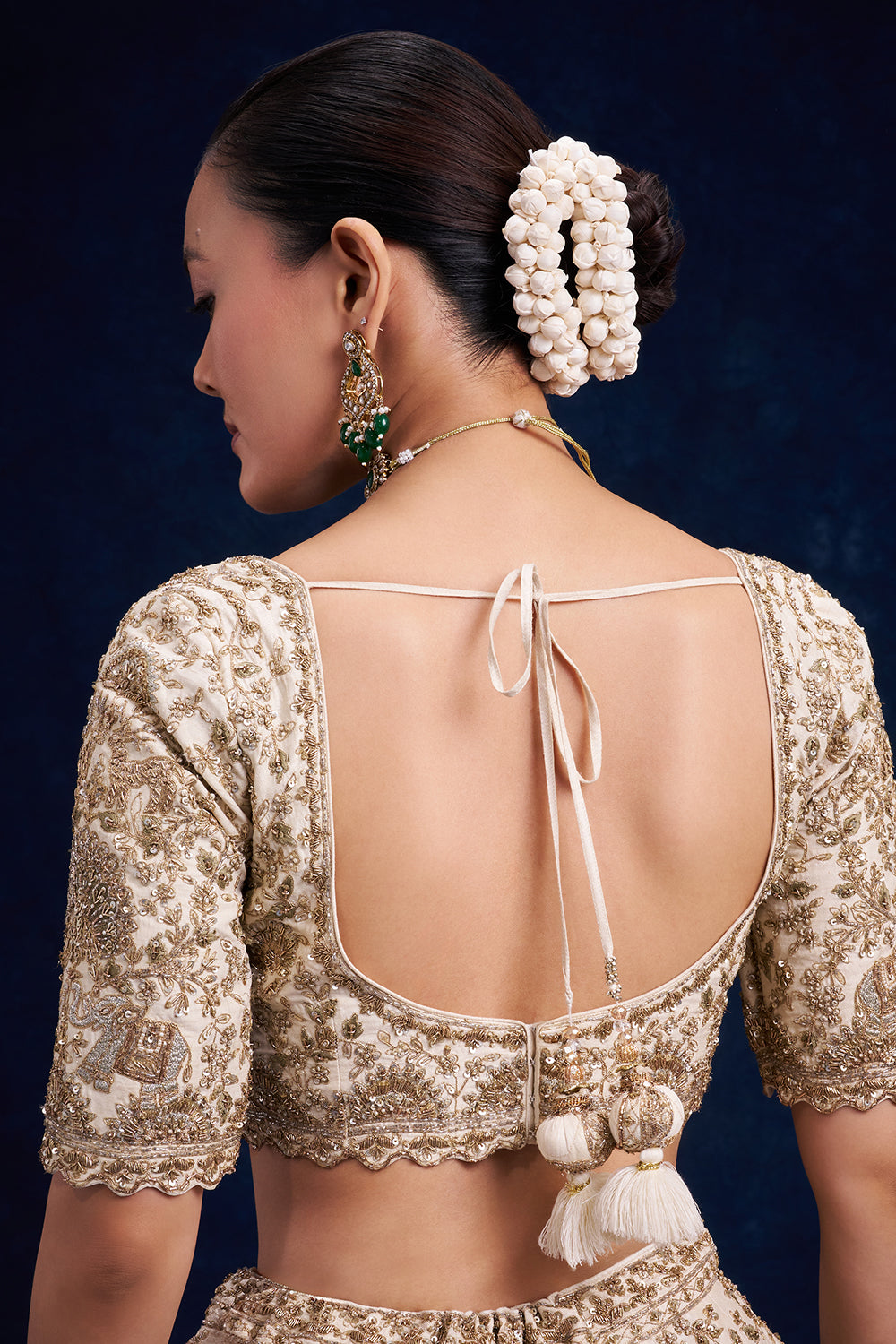 Ivory Raw Silk Bridal Lehenga with Zardozi and Zari Work