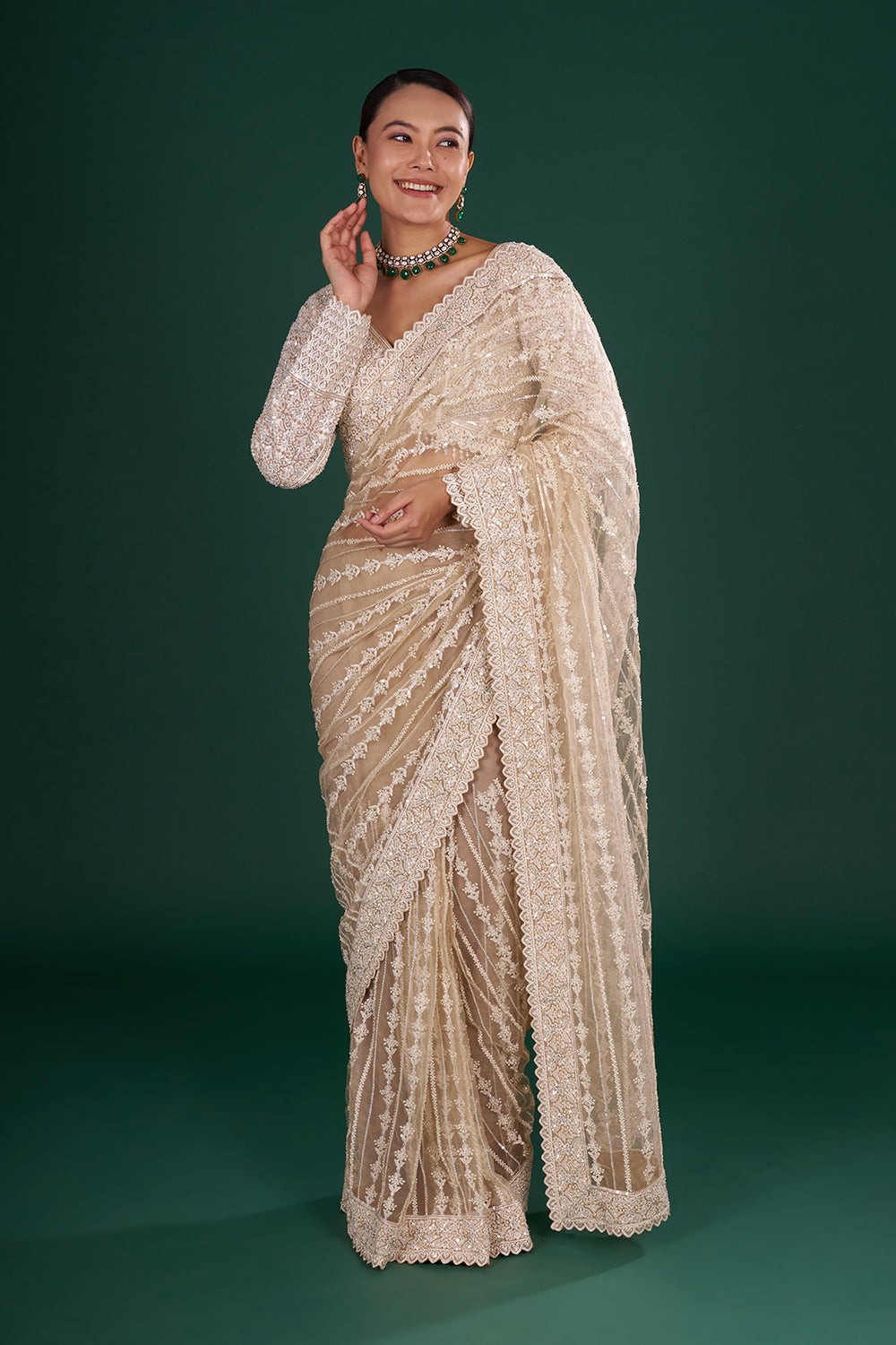 Light Gold Net Saree with Sequin Embroidery and Stitched Blouse
