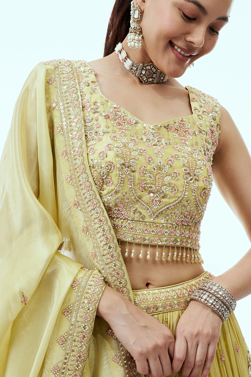 Pastel Yellow Tissue Lehenga with Zari and 3D Tiki Work