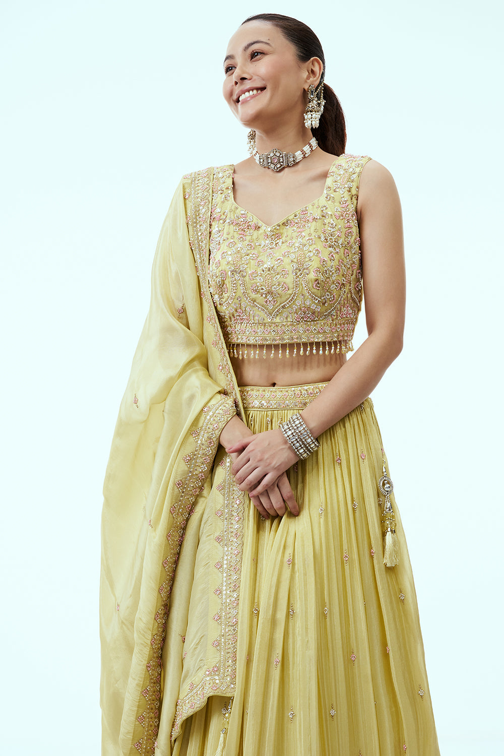 Pastel Yellow Tissue Lehenga with Zari and 3D Tiki Work