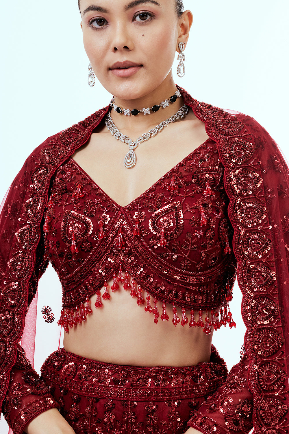 Maroon Net Lehenga with Sequins and Cutdana Hand Work