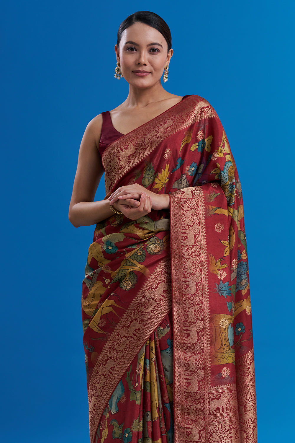 Maroon Silk Saree with Animal-Inspired Motifs Border And Unstitched Blouse