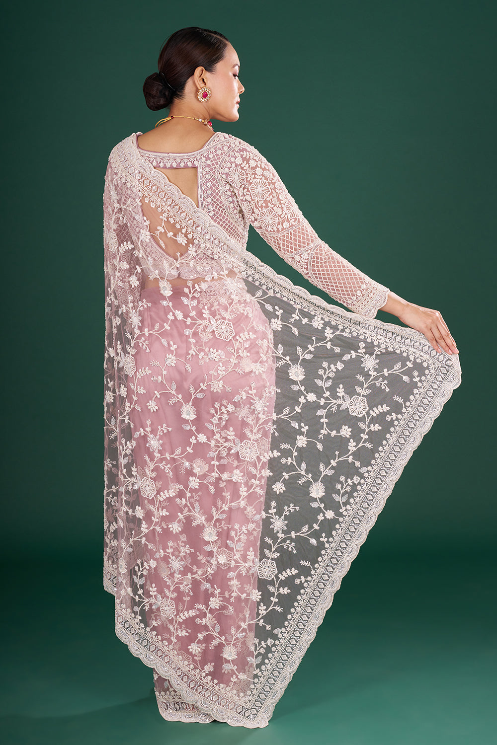 Mauve Embroidered Net Saree with Floral Embellishments and Stitched Blouse
