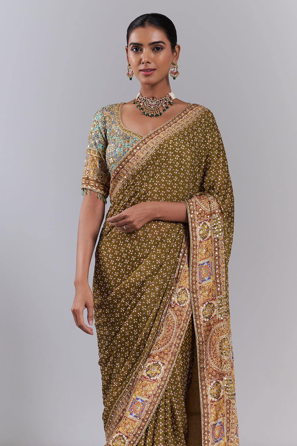 Mehendi Green Crepe Embellished Saree And Stitched Blouse