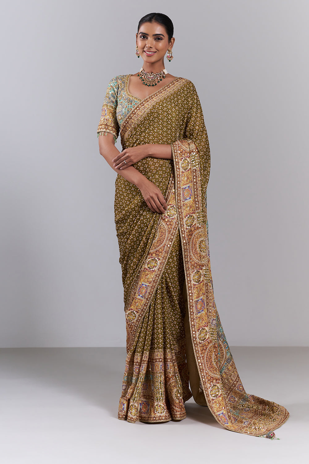 Mehendi Green Crepe Embellished Saree And Stitched Blouse