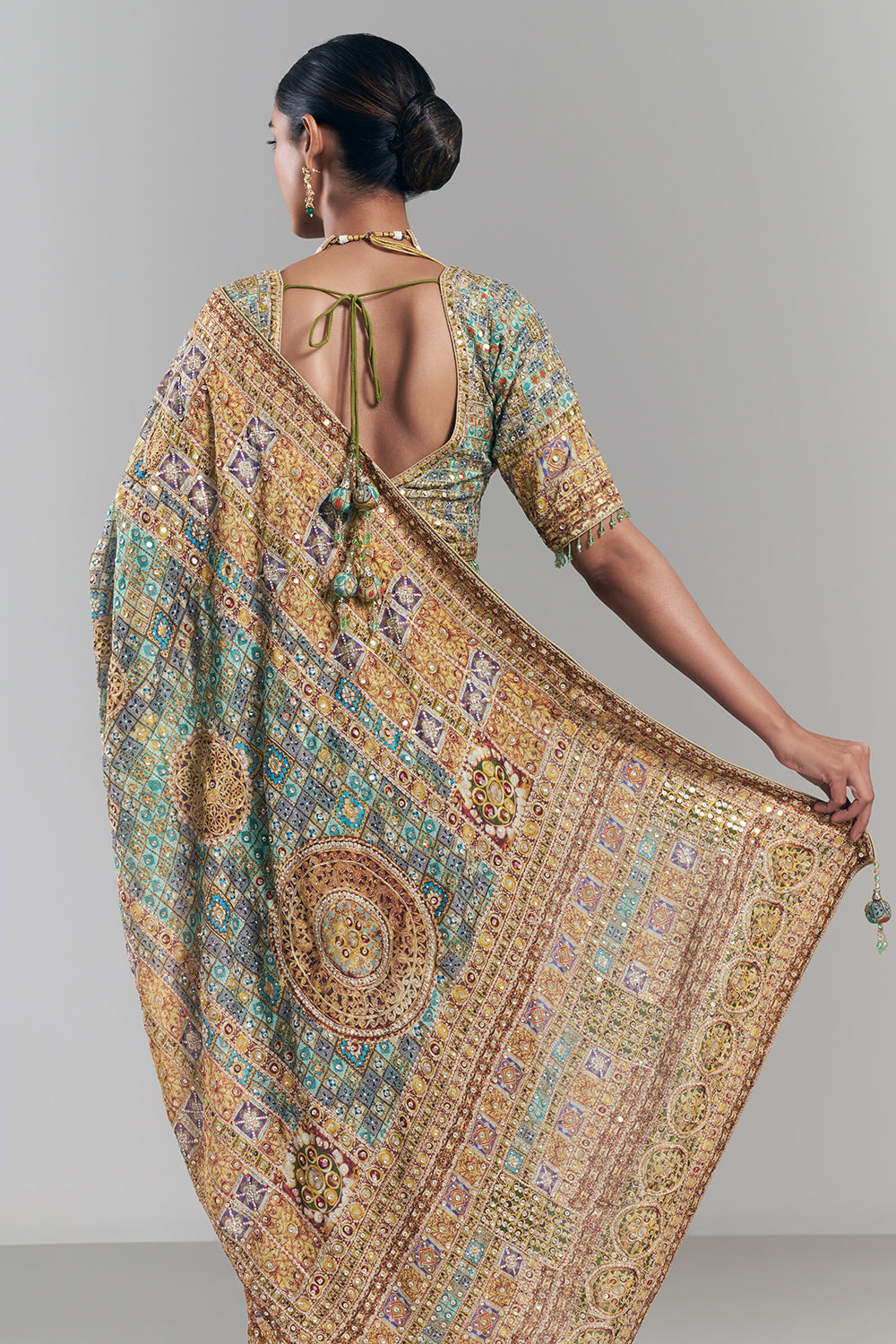 Mehendi Green Crepe Embellished Saree And Stitched Blouse