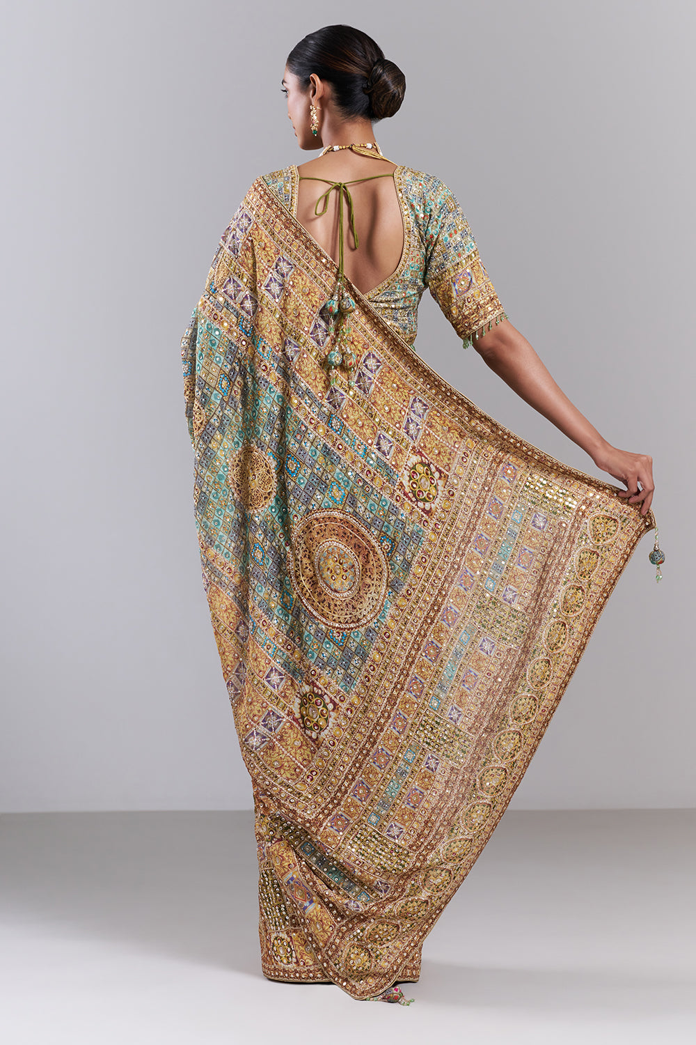 Mehendi Green Crepe Embellished Saree And Stitched Blouse