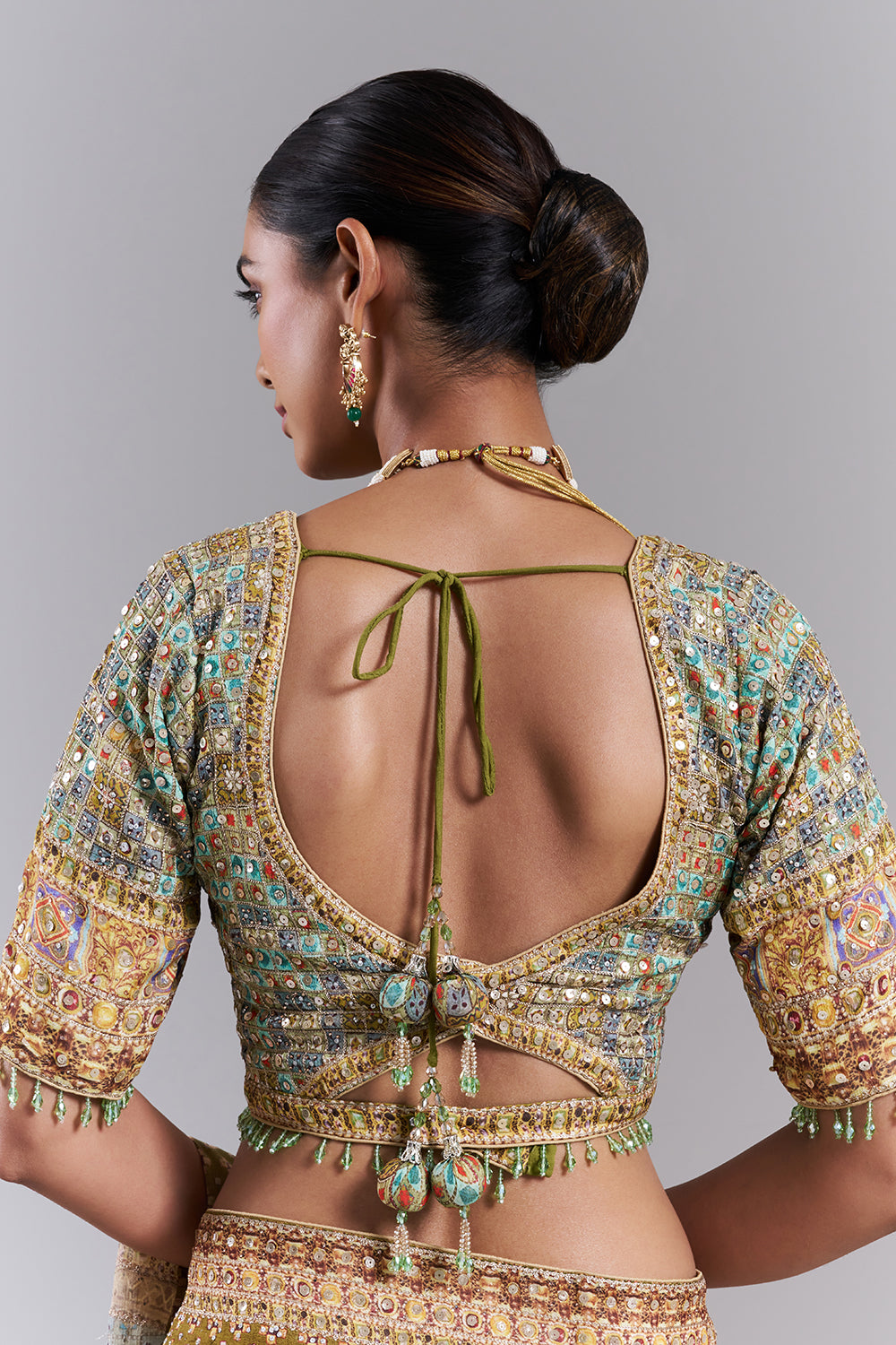 Mehendi Green Crepe Embellished Saree And Stitched Blouse
