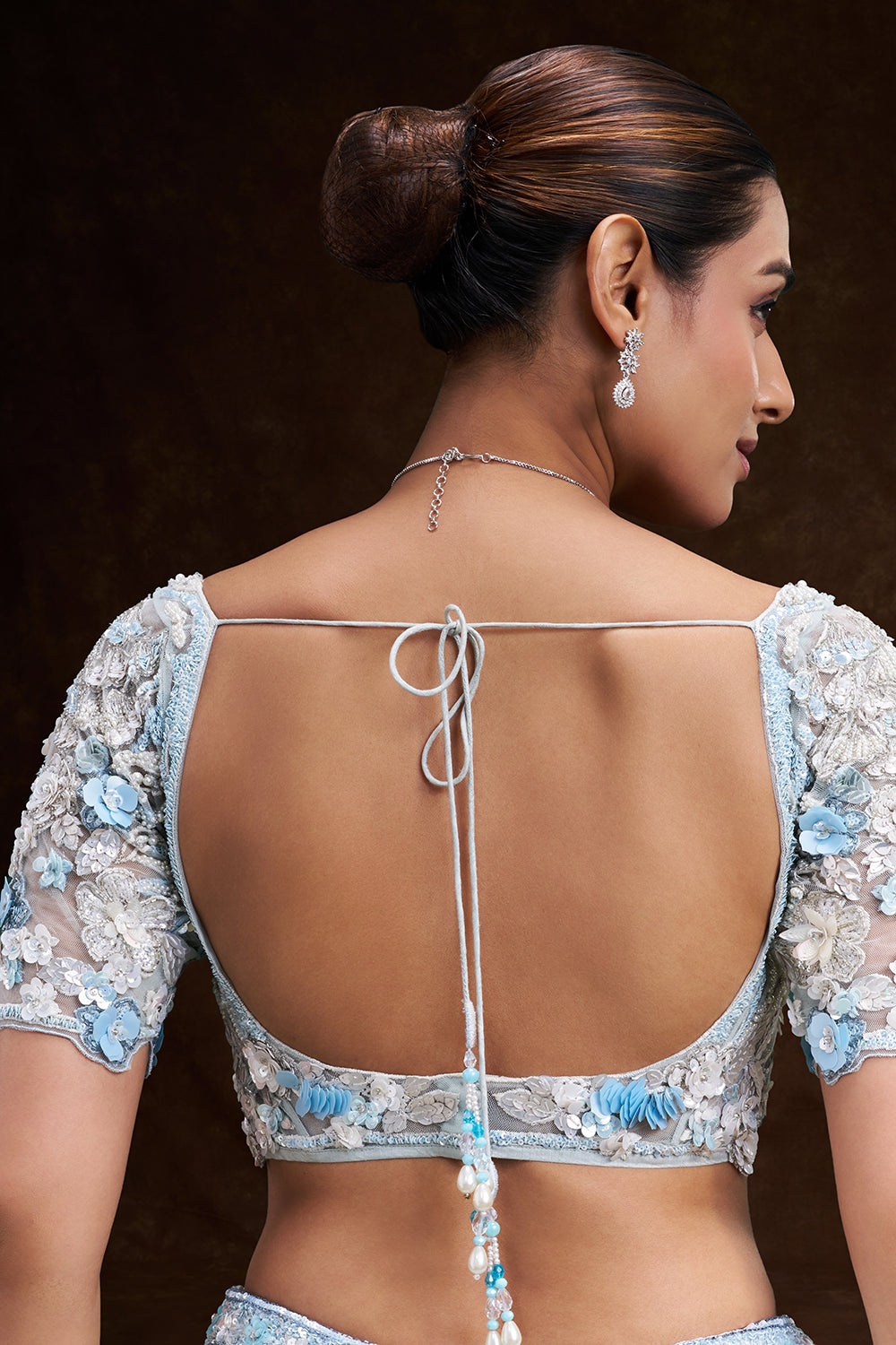 Mint Blue Net Bridal Lehenga with 3D Floral and Vine Embroidery