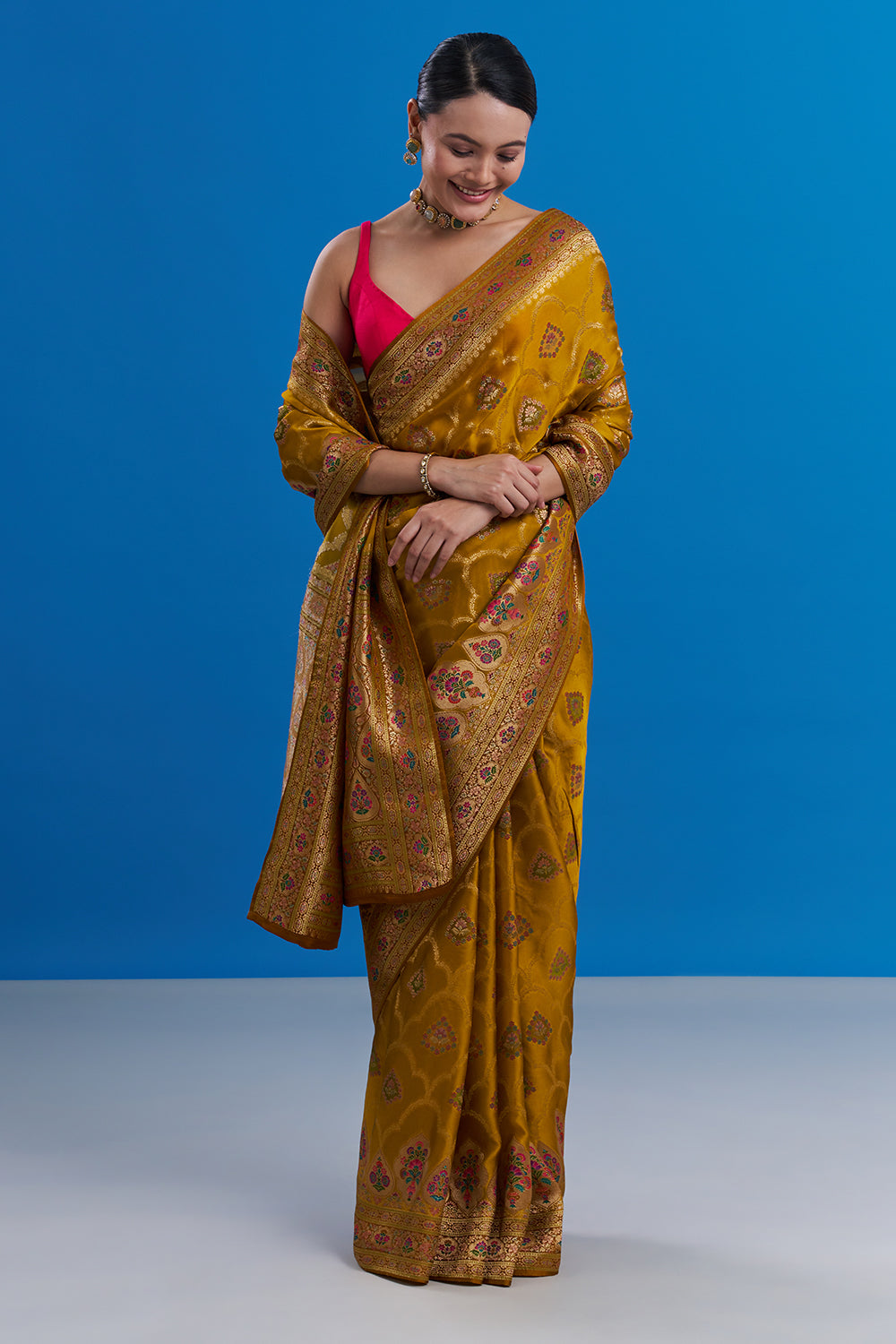 Mustard Yellow Modal Saree with Floral Motifs And Unstitched Blouse