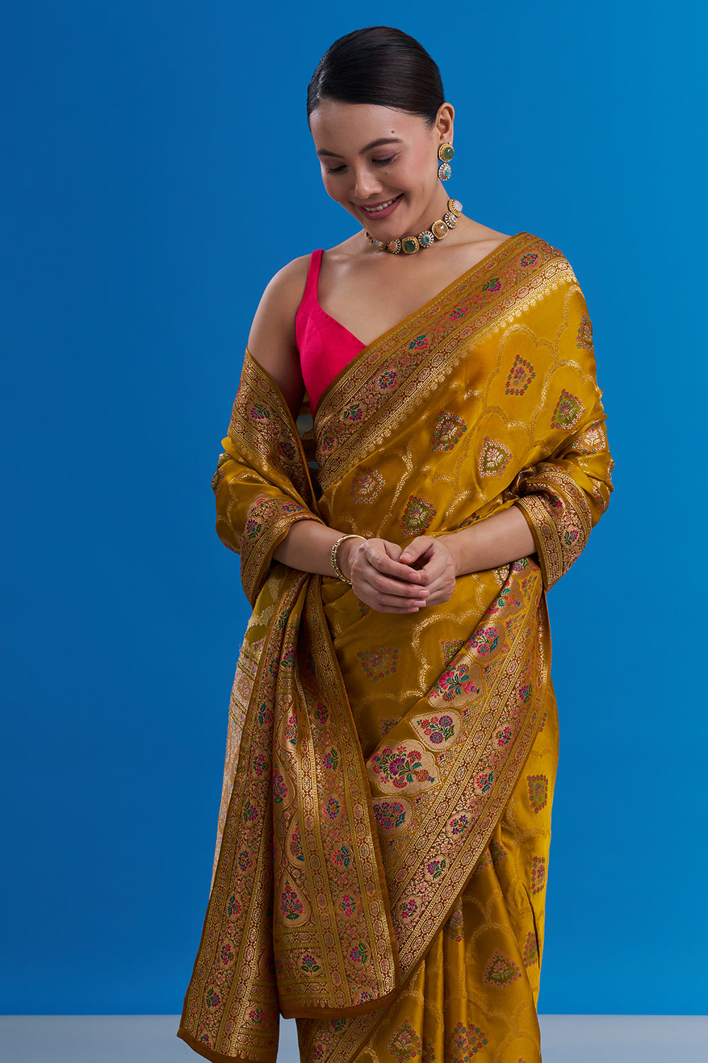Mustard Yellow Modal Saree with Floral Motifs And Unstitched Blouse