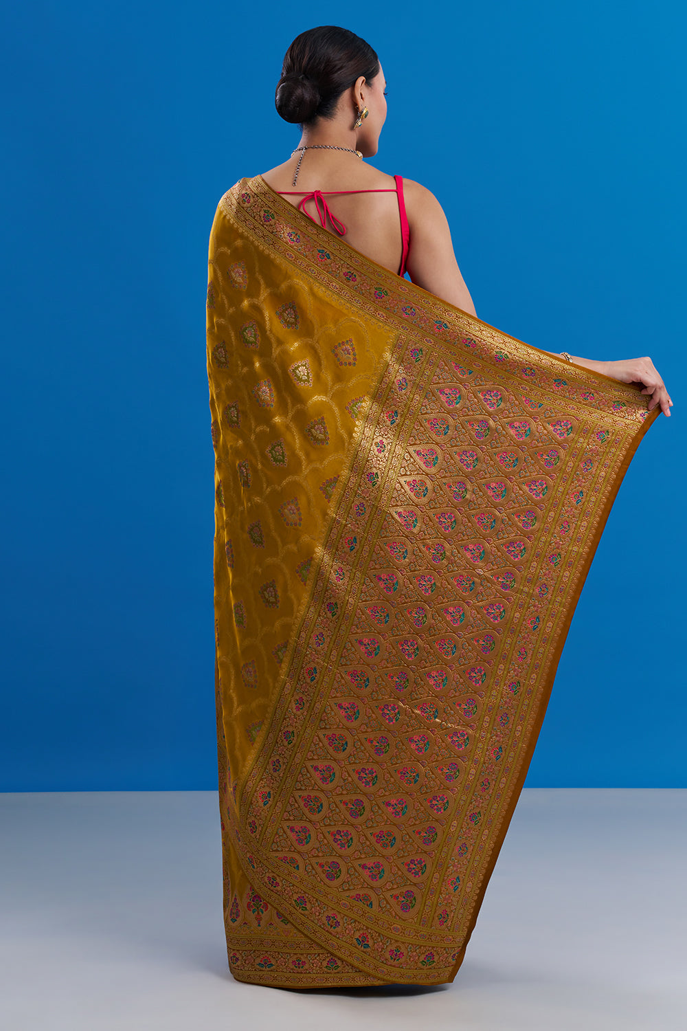 Mustard Yellow Modal Saree with Floral Motifs And Unstitched Blouse