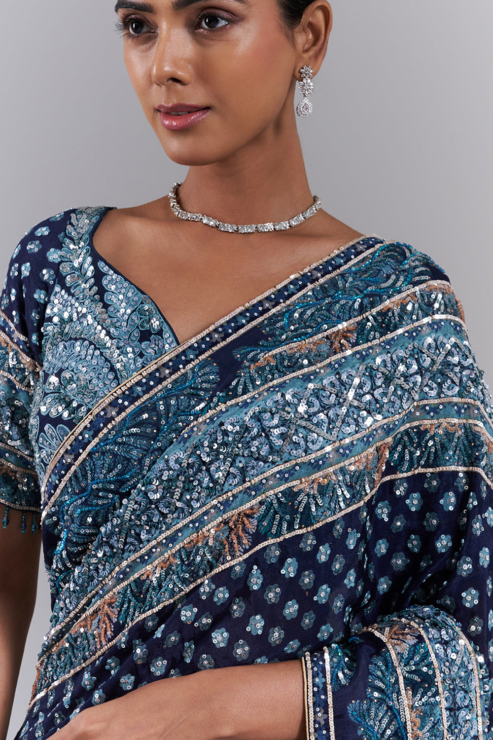 Navy Blue Crepe Embellished Saree And Stitched Blouse