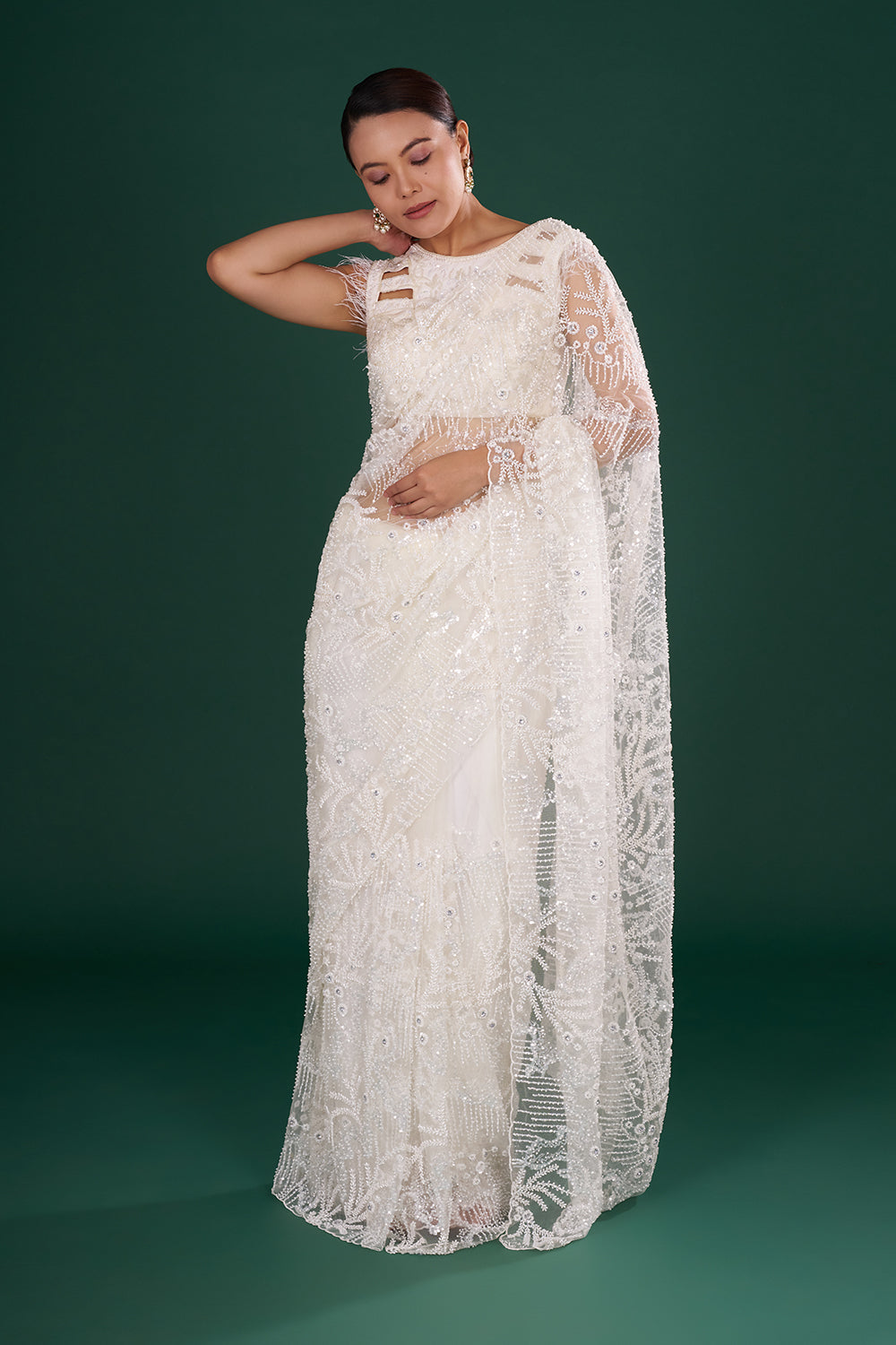 Off-White Net Saree in Abstract Pattern with Cutdana Embroidery